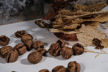 Tarhana cips, crispy snacks a traditional turkish anatolian fermented soup base made into crunchy chips made of youghurt and cereals, served with walnuts