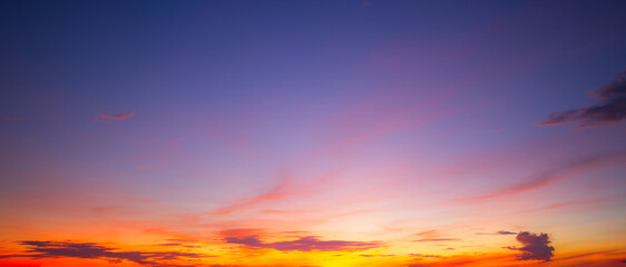 Orange sky and clouds background,Beautiful of luxury soft gradient orange gold clouds and sunlight on the blue sky perfect for the background, take in everning,Twilight