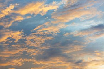 Orange sky and clouds background,Beautiful of luxury soft gradient orange gold clouds and sunlight on the blue sky perfect for the background, take in everning,Twilight