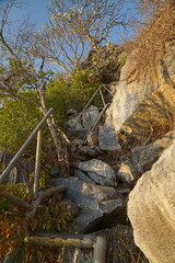 Climbing a rocky trail scenic mountain action adventure natural environment aerial view exploration journey