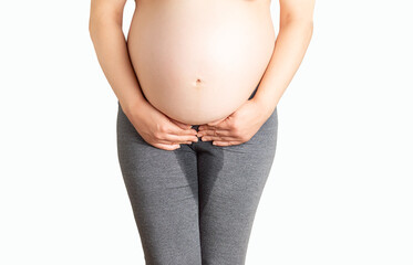Naklejka premium Pregnant woman with pants wet with urine due to incontinence and isolated in white background