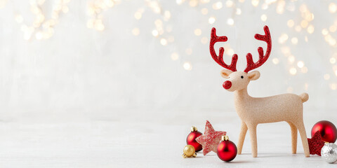 Fototapeta premium Golden reindeer ornament with red Christmas decorations, sparkling lights create festive atmosphere. Perfect for holiday celebrations and winter decor