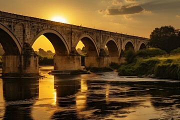 Ancient roman stone arches bridge crossing river, iconic historic roman architecture
