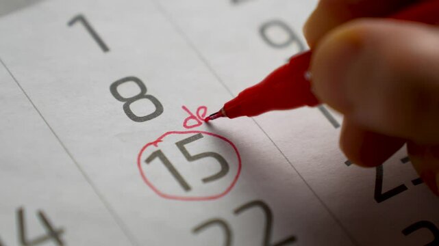 Dentist appointment, Dental Hygiene and Health concept. Woman hand marking on calendar dentist visiting day, close-up