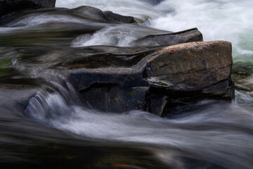 flowing water at the stream in the autumn valley