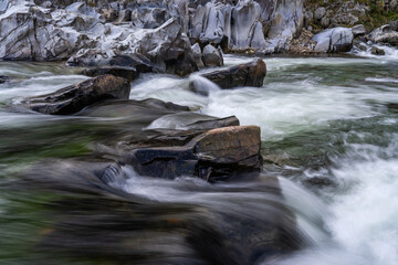 flowing water at the stream in the autumn valley
