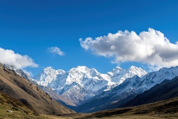 Fototapeta premium majestic snow-capped mountains under a clear blue sky
