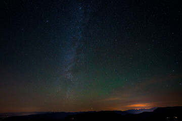 Fototapeta premium Starry sky over Seiser Alm in the Dolomites, Italy.