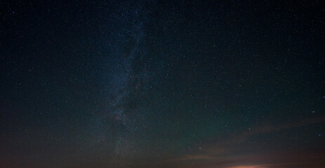Starry sky over Dolomites, background.