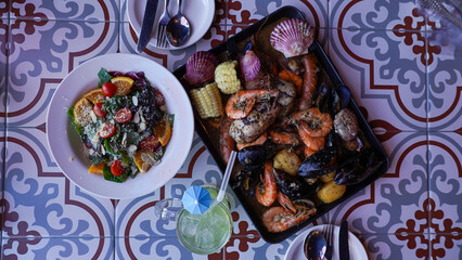 Steamed seafood and fruit salad