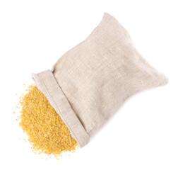 Raw bulgur and overturned burlap sack isolated on white, top view
