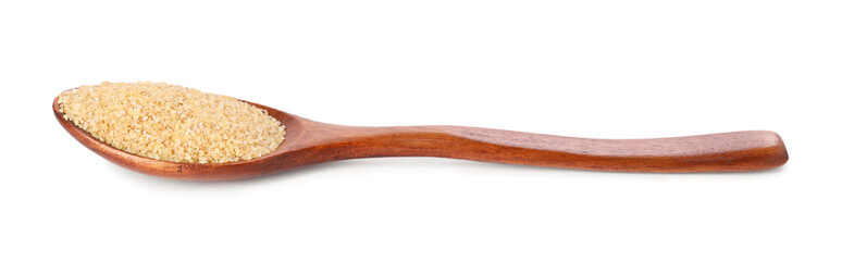 Spoon with raw wheat groats isolated on white