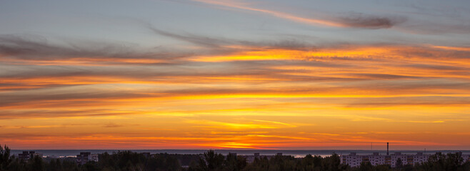 Bright and mysterious dawn, beautiful clouds on the horizon