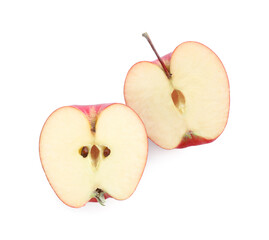 Halves of red apple isolated on white, top view