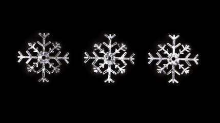 Three Sparkling Snowflakes Against Black Background