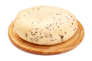 Piece of fresh Cheese with Cumin Seeds, close-up, isolated on white background.