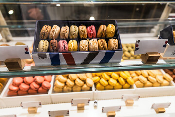 Various assortment of desserts confectionery on the counter in a bakery