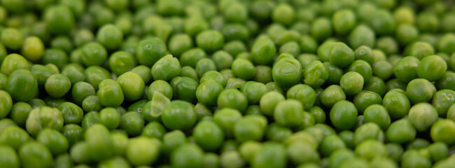 Green Peas. Green background. Peas background. Top view.