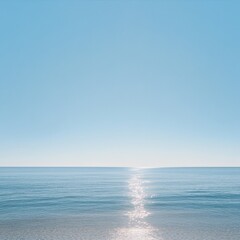 calm ocean view with clear blue sky and gentle waves