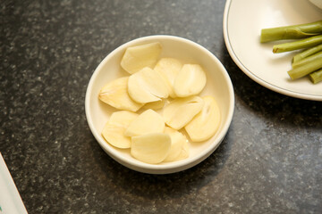 sliced garlic on a plate