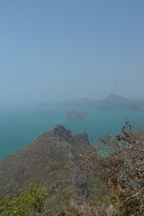 Exploring scenic coastal peaks tropical island landscape photography serene atmosphere aerial view nature's beauty