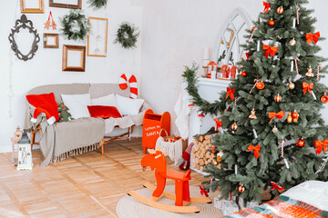 Festive holiday living room with a decorated Christmas tree and cozy seating