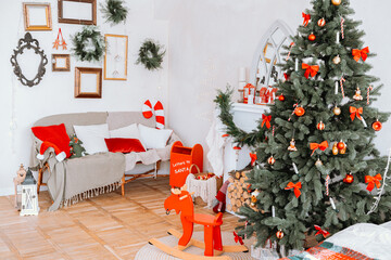 Cozy Christmas living room decor with a tree and festive ornaments