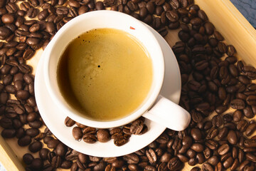 cup of coffee with beans