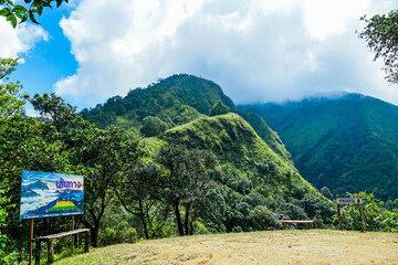 Exploring scenic mountain peaks nature reserve photography lush greenery panoramic view adventure travel