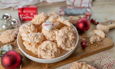 Christmas coconut macaroons on a plate with decoration