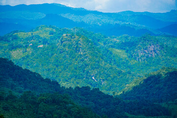 Mountain exploration adventure lush green hills nature photography scenic view panoramic landscape wilderness serenity