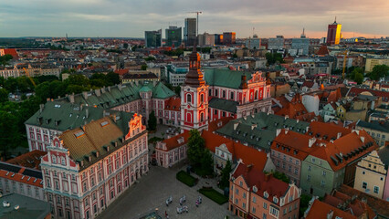 aerial view of Kolegiac Square in Poznań in Poland at sunset in spring © MKavalenkau