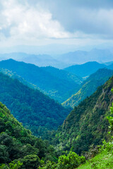 Fototapeta premium Breathtaking mountain landscape lush green valley nature photography serene environment wide angle view natural beauty