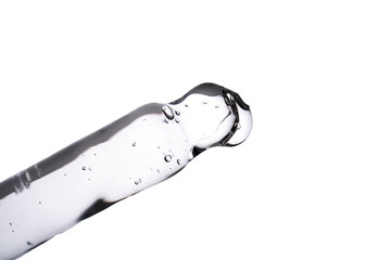 Dropper pipette with delicious serum with bubbles close-up.