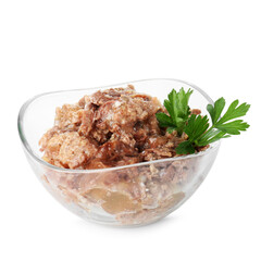 Canned meat and parsley in bowl isolated on white