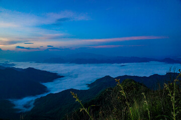 Sunrise over misty mountains scenic landscape nature photography tranquil environment aerial view serenity in nature