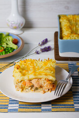Creamy fish pie or fisherman's pie - traditional British and Irish dish