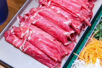 beef for shabu shabu on a plate