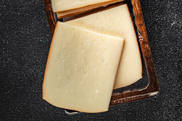 Raclette cheese tasty food dish fresh delicious gourmet food background on the table rustic food top view copy space top view