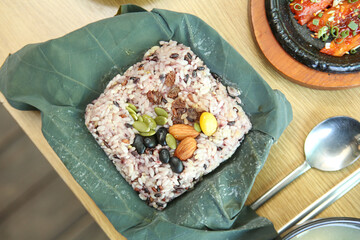 rice and nuts wrapped in lotus leaves