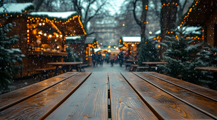 Obraz premium Empty wooden table in a snowy Christmas market in the evening. Generative AI.