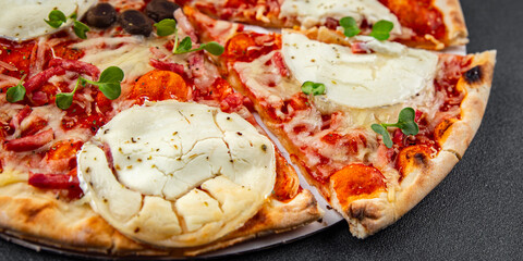 Pizza goat cheese, tomato sauce, bacon tasty food dish fresh delicious gourmet food background on...