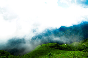 Breathtaking mountain view lush green hills nature photography cloudy sky scenic landscape tranquility and serenity