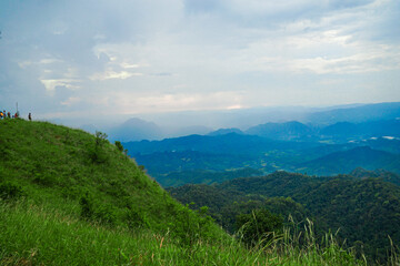 Breathtaking mountain hike adventure scenic overlook nature exploration vibrant greenery panoramic view outdoor experience