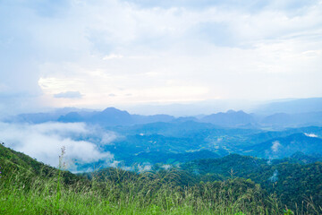Breathtaking sunrise over misty mountains nature landscape scenic view outdoor adventure tranquil...