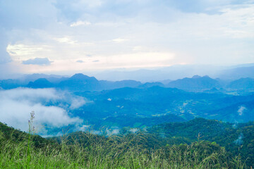 Breathtaking sunrise over mountain range scenic viewpoint nature photography cloudy skies serene landscape outdoor adventure