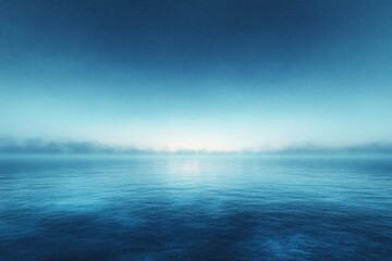 Fototapeta premium Serene Ocean Mist A Calm Seascape Under A Blue Sky