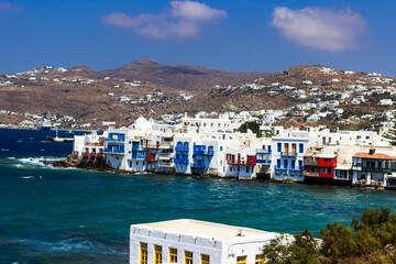 View of traditional greek village with white houses on Mykonos Island, Greece