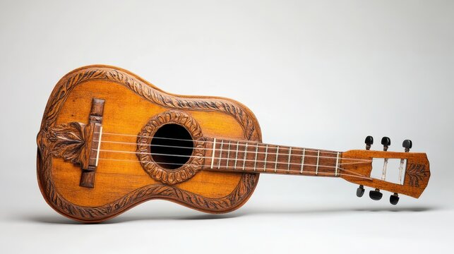 This charango features fine wood details and traditional craftsmanship on a simple backdrop