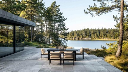 Fototapeta premium photography of a modern outdoor dining table with comfy beige chairs in a black wood terrace, overlooking a puerto varas lake and pine trees. The view is of calm water 